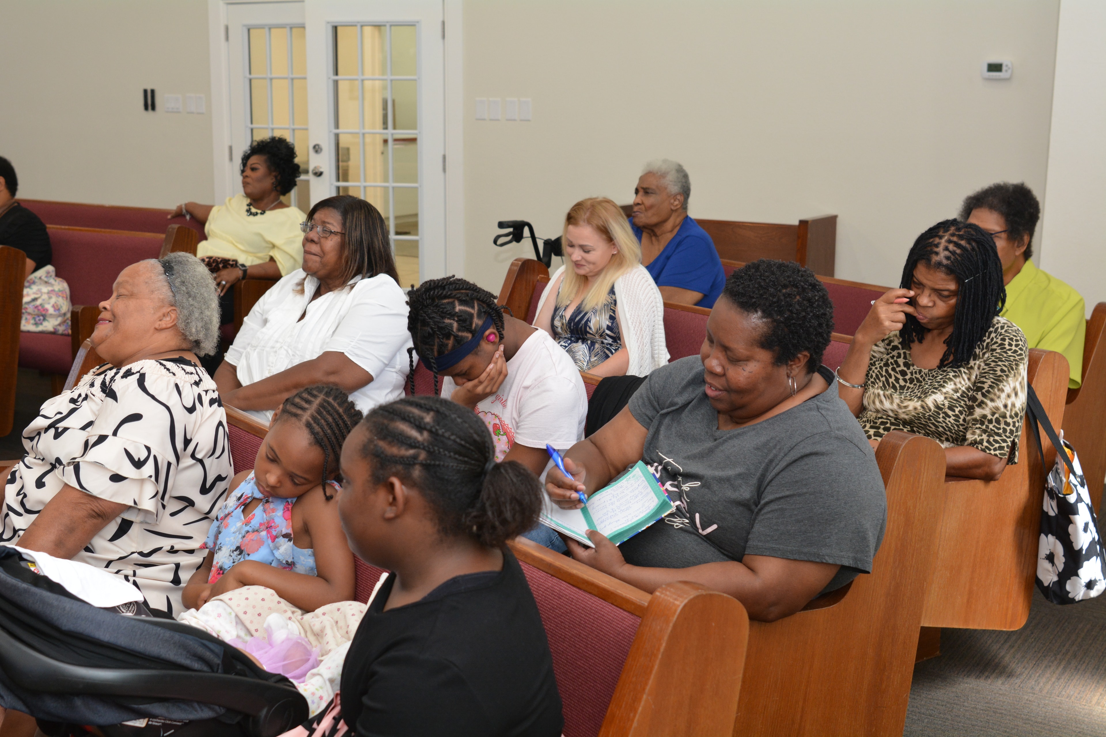 Church members sharing fellowship at Sinclair Church of Christ